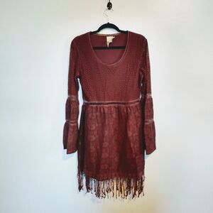 Sea Gypsy long sleeve flared boho cottagecore dress with lace inserts in the sle